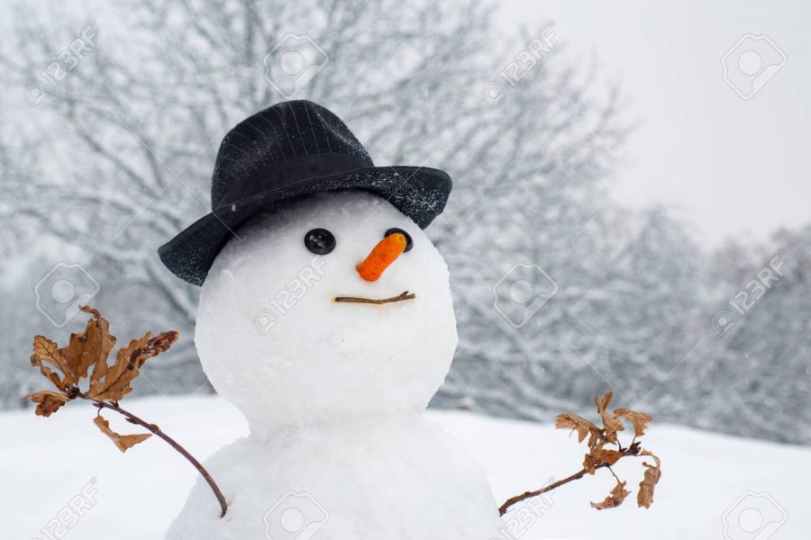 Snowman with light star in Christmas day. Snow man in winter hat. Funny snowmen. Making snowman and winter fun. Snowman gentleman in winter hat