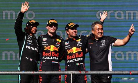 AUSTIN, TEXAS - OCTOBER 24: Race winner Max Verstappen of Netherlands and Red Bull Racing, second placed Lewis Hamilton of Great Britain and Mercedes GP, third placed Sergio Perez of Mexico and Red Bull Racing and Masashi Yamamoto of Honda celebrate on the podium during the F1 Grand Prix of USA at Circuit of The Americas on October 24, 2021 in Austin, Texas. (Photo by Chris Graythen/Getty Images)